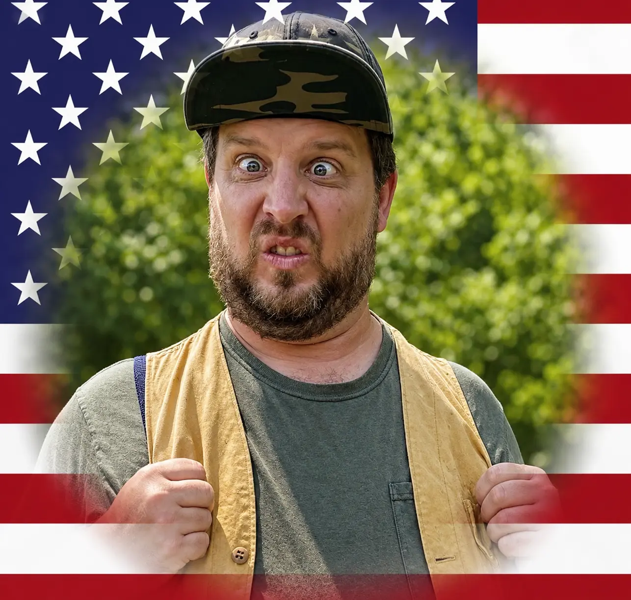 Cousin Earl in a camouflage cap and vest in front of an American flag